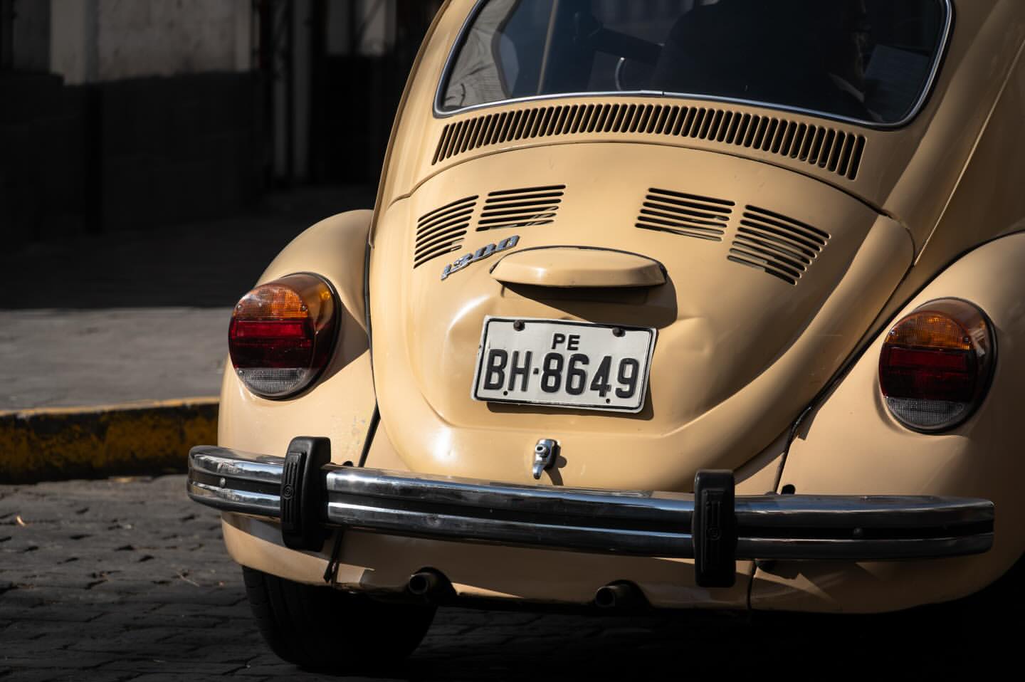Vintage cream Volkswagen Beetle on a street in Arequipa