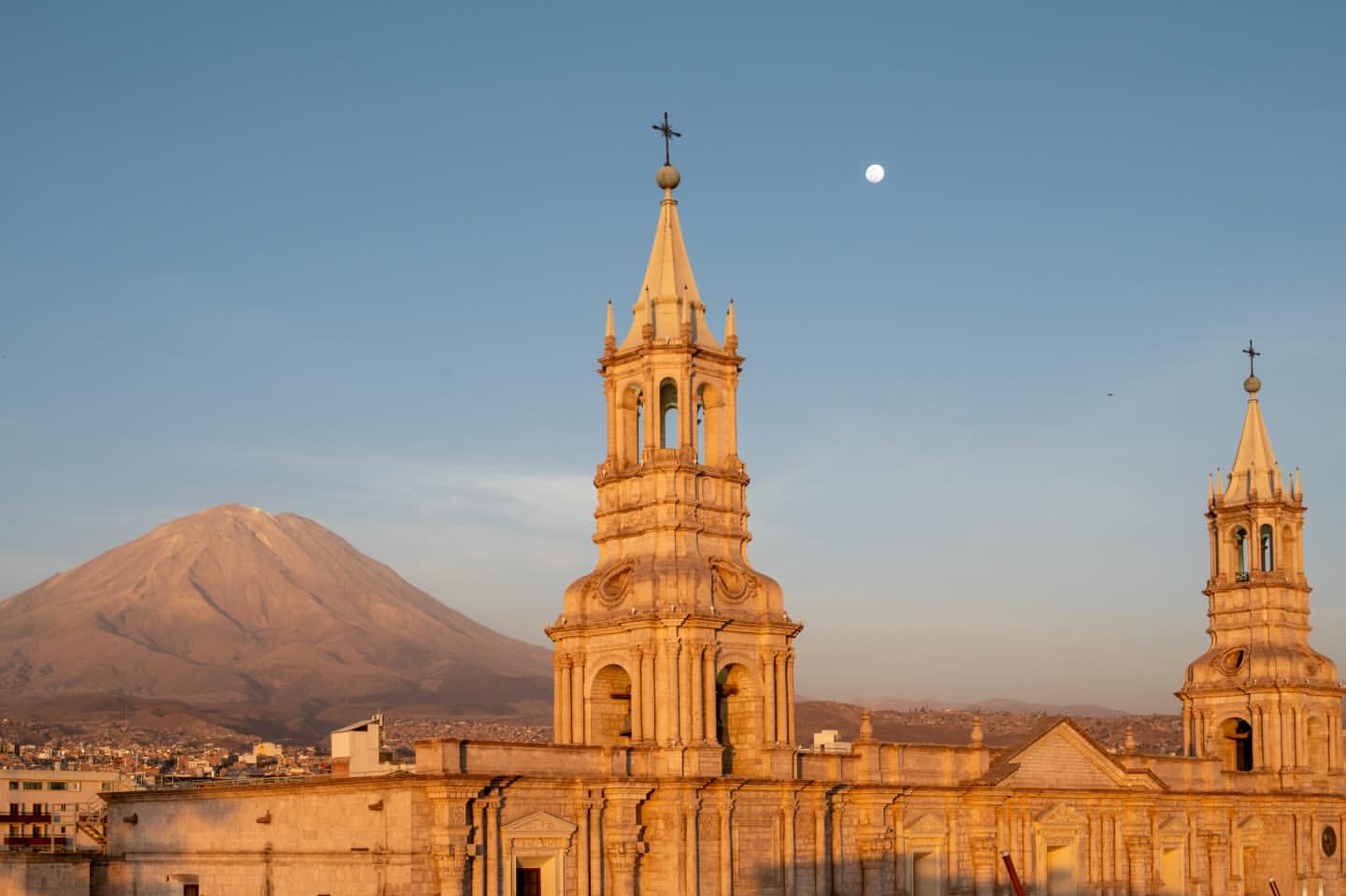 Arequipa Cathedral towers with Misti volcano and the moon